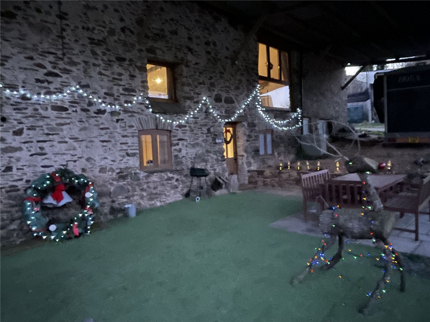 Outside Christmas lights at Woodbury farm cottages